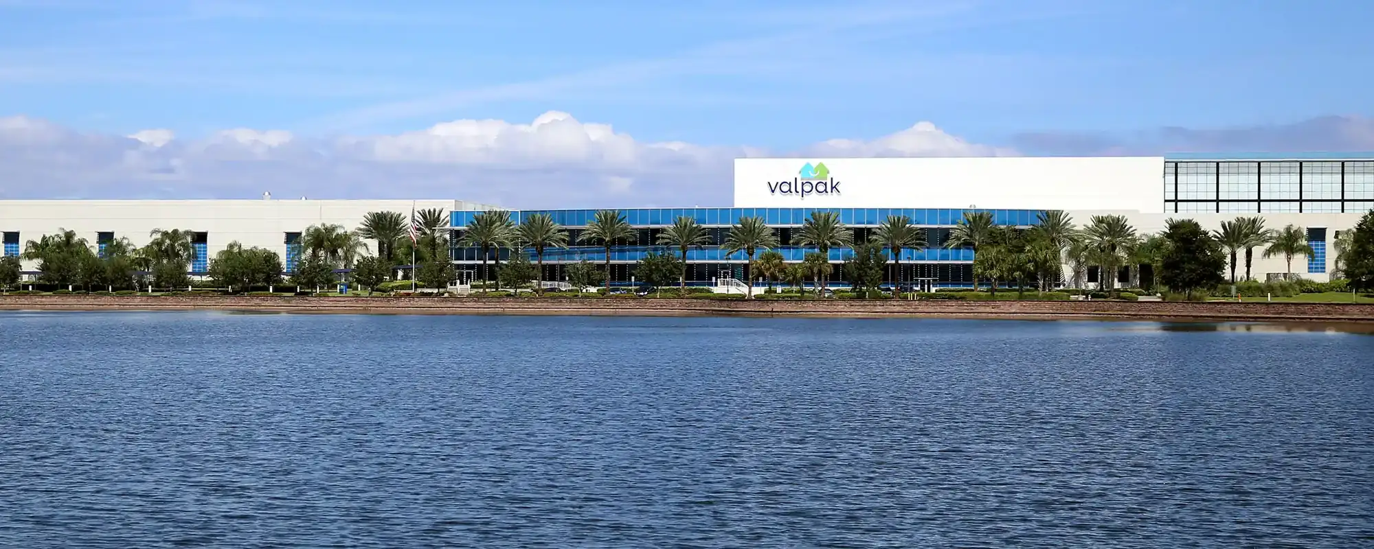 The Valpak Manufacturing Center in St. Petersburg, Florida, seen across the lake